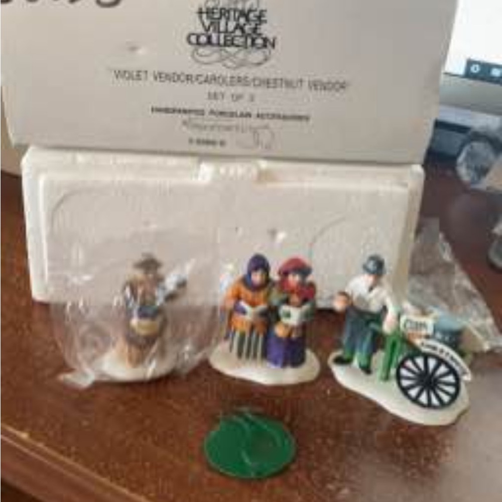 Department 56 Heritage Village, Violet vendor, Carolers and Chestnut vendor